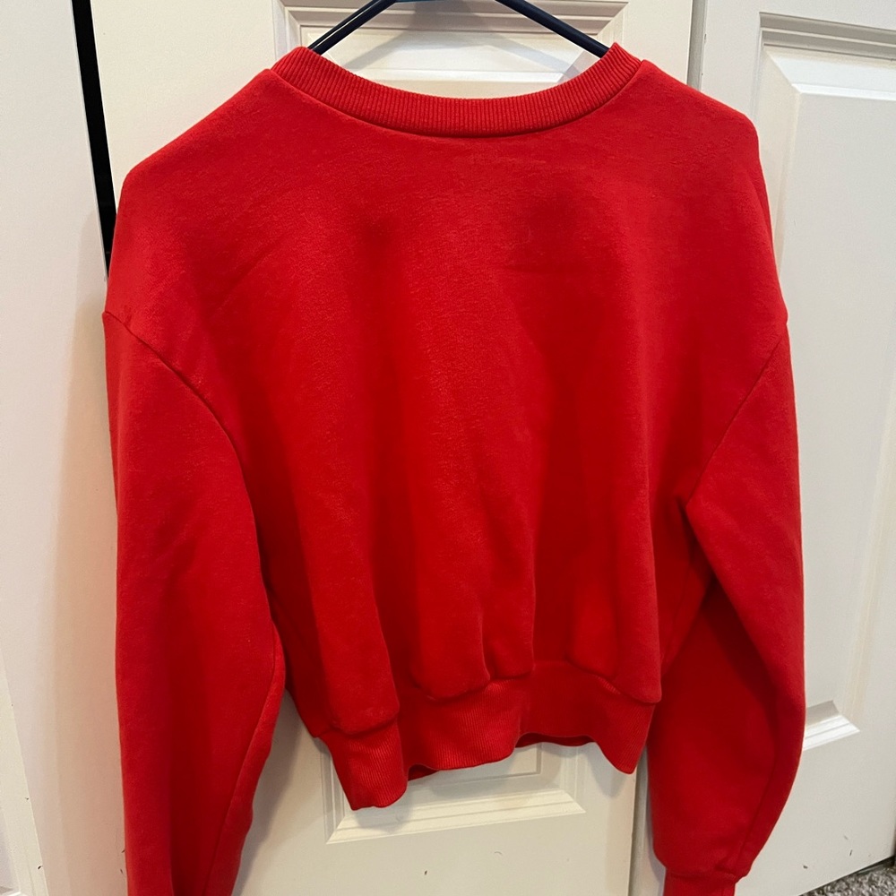 Red crop top sweatshirt.